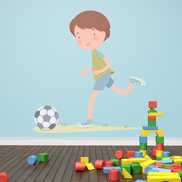Kinderzimmer Wandtattoo: Junge, der Fußball spielt