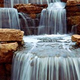 Fototapeten: Wasserfall und Steine 3