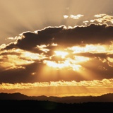 Fototapeten: Sonnenuntergang hinter den Wolken 2